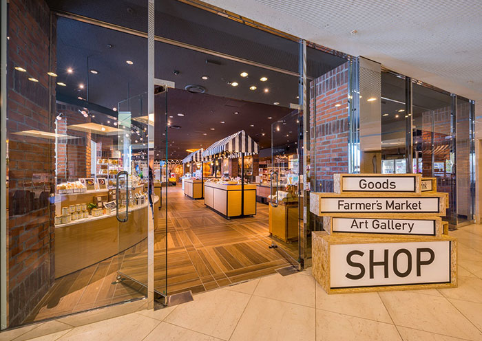A spacious souvenir shop lined with attractive products.